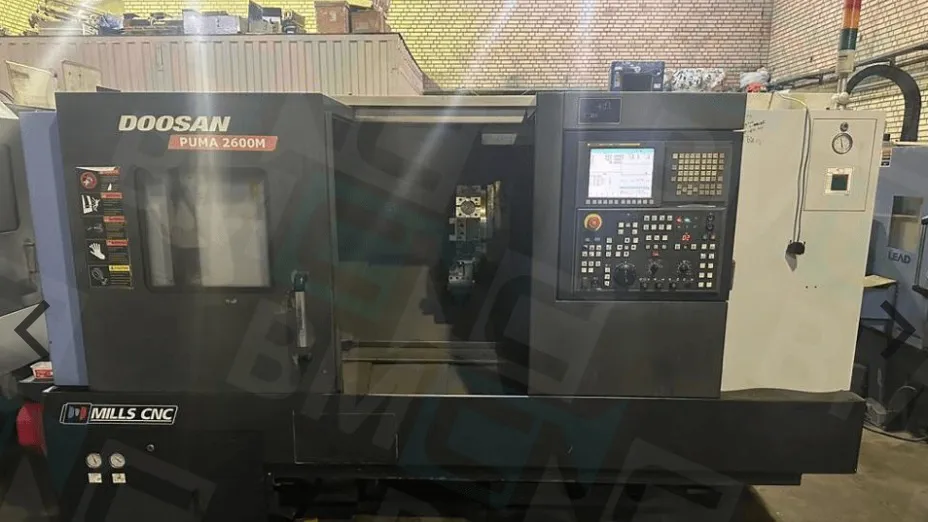 دستگاه تراش سه محور Doosan puma 2600 m cnc